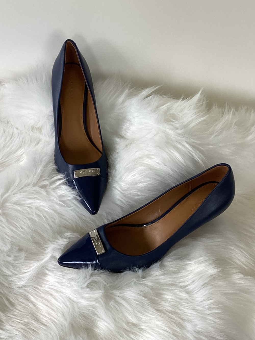 Coach Navy Pointed Toe Flats with Silver Logo Plate